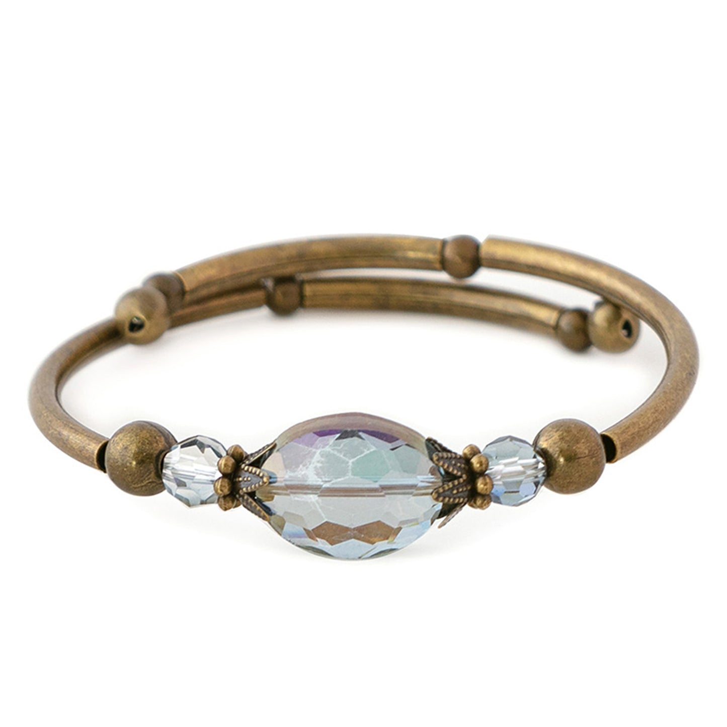 Brass bracelet with a large crystal bead on a white background