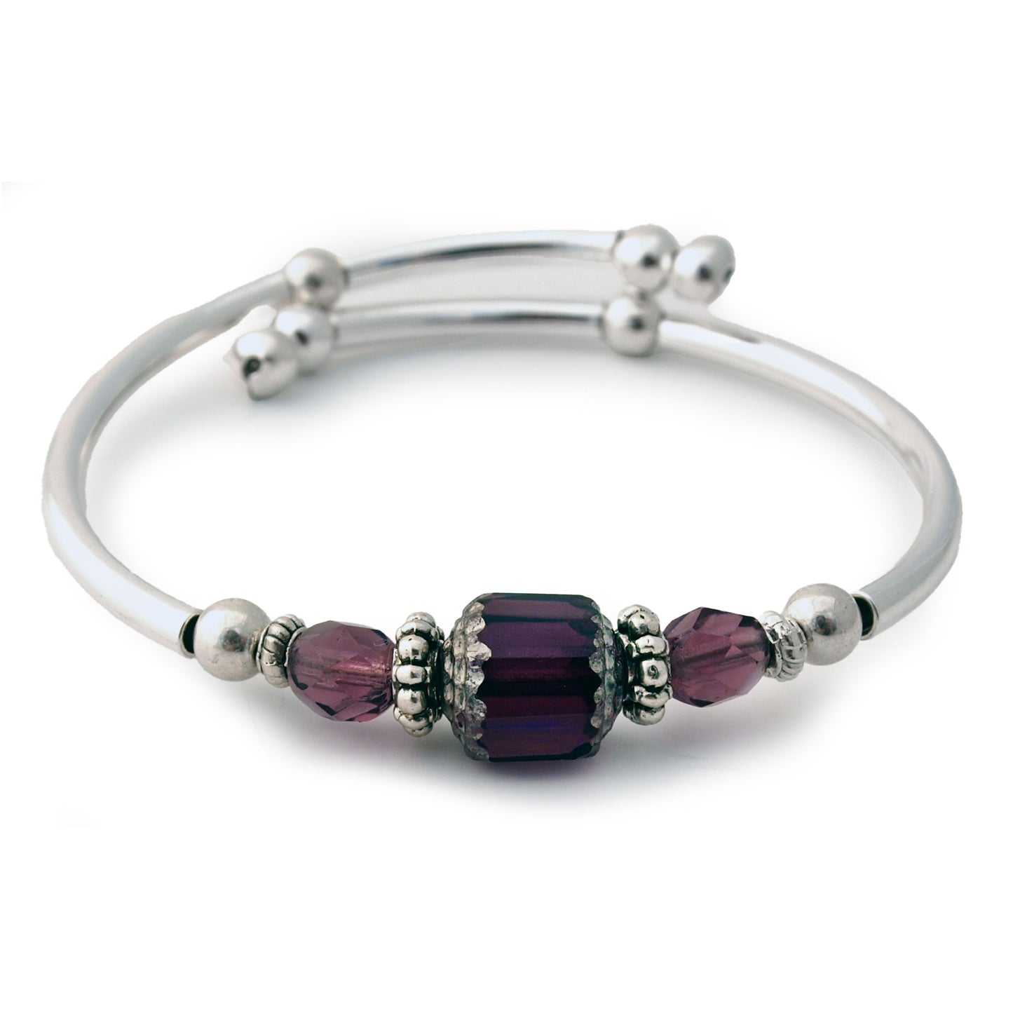 Silver bracelet with purple beads on a white background