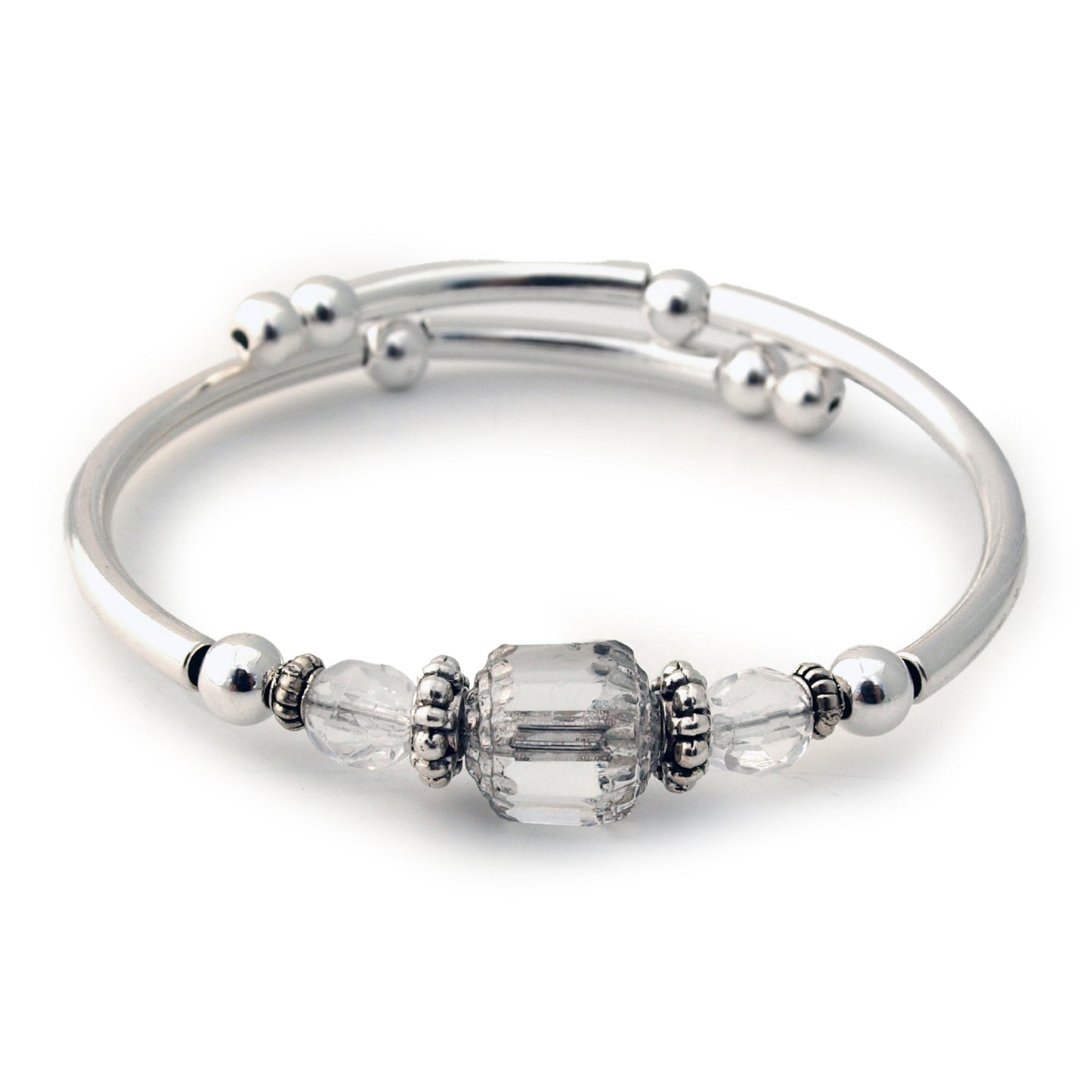 Silver bracelet with clear bead on a white background