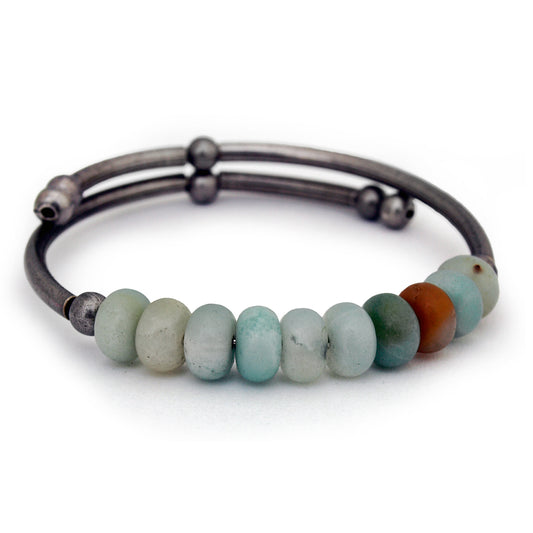 Antique silver Bracelet with light aqua Amazonite beads on a white background
