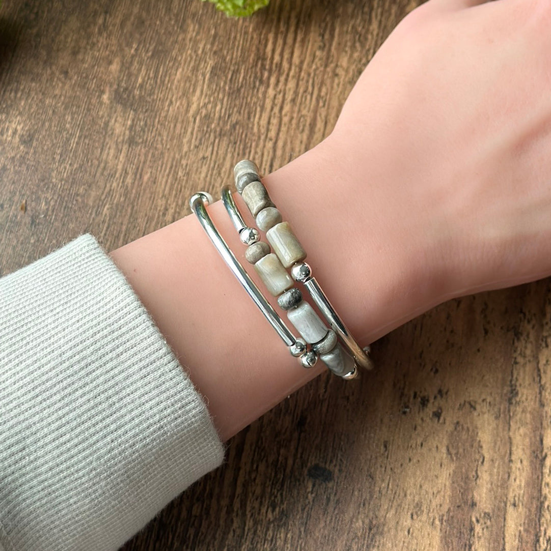 White beaded bracelet on wrist