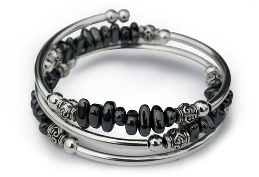 Black pebble bracelet on a white background