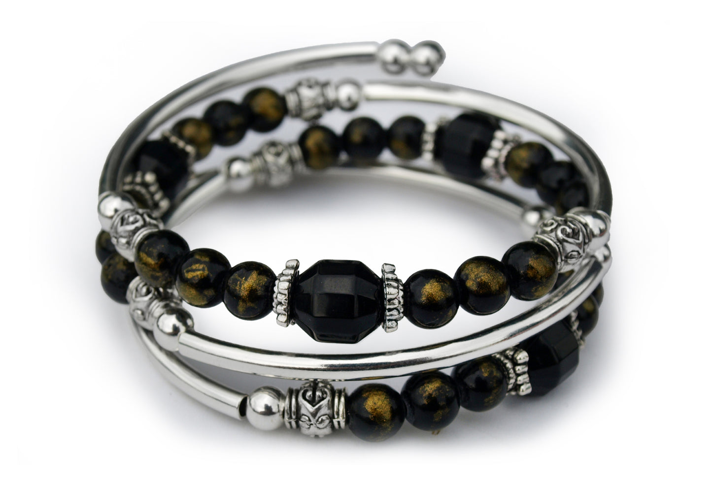 Black and gold beaded bracelet on white background
