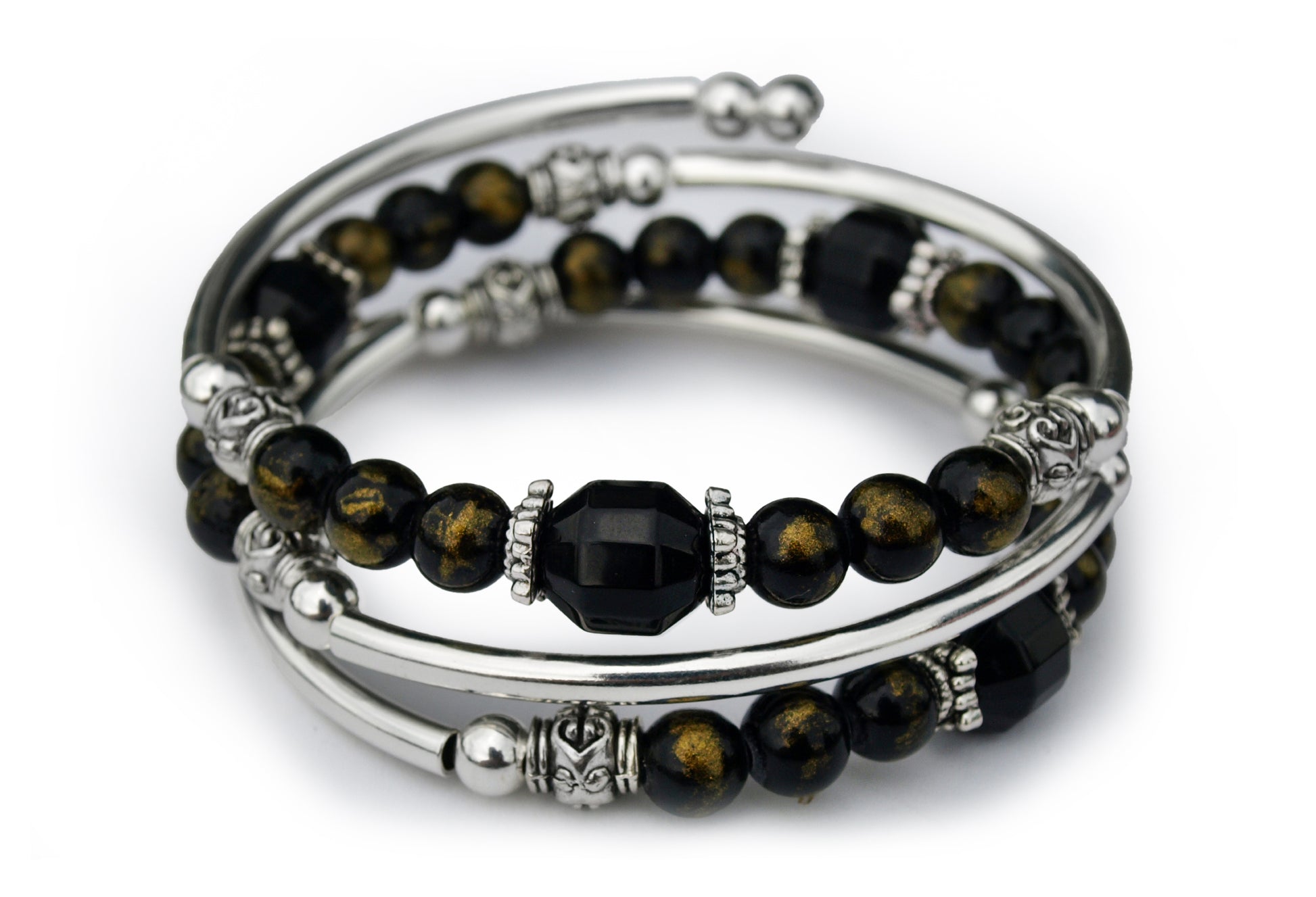 Black and gold beaded bracelet on white background