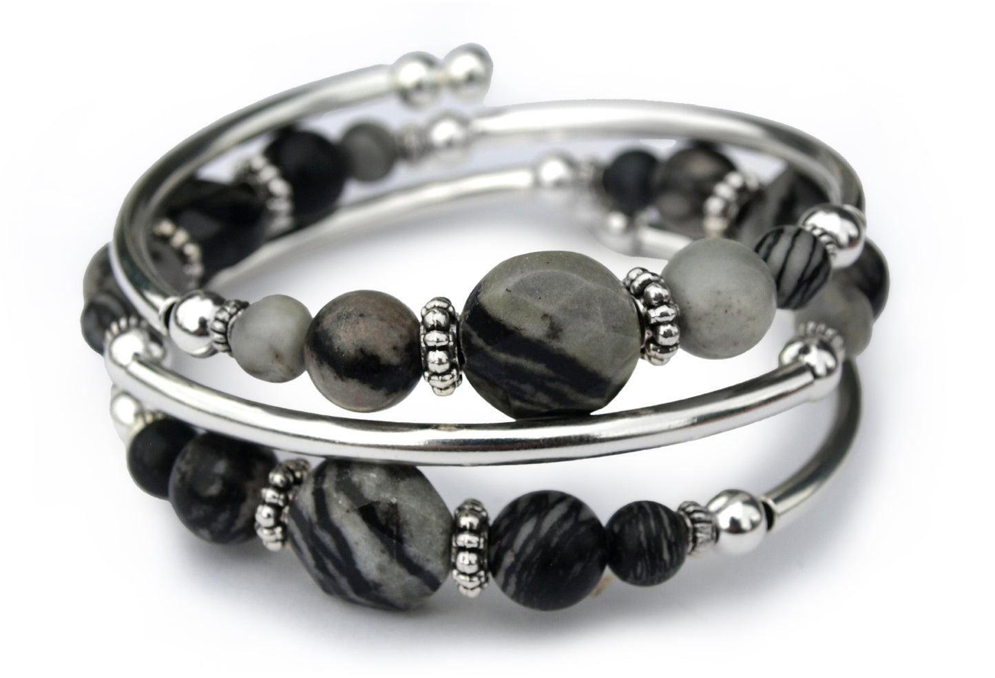 Gray and black beaded bracelet on a white background 