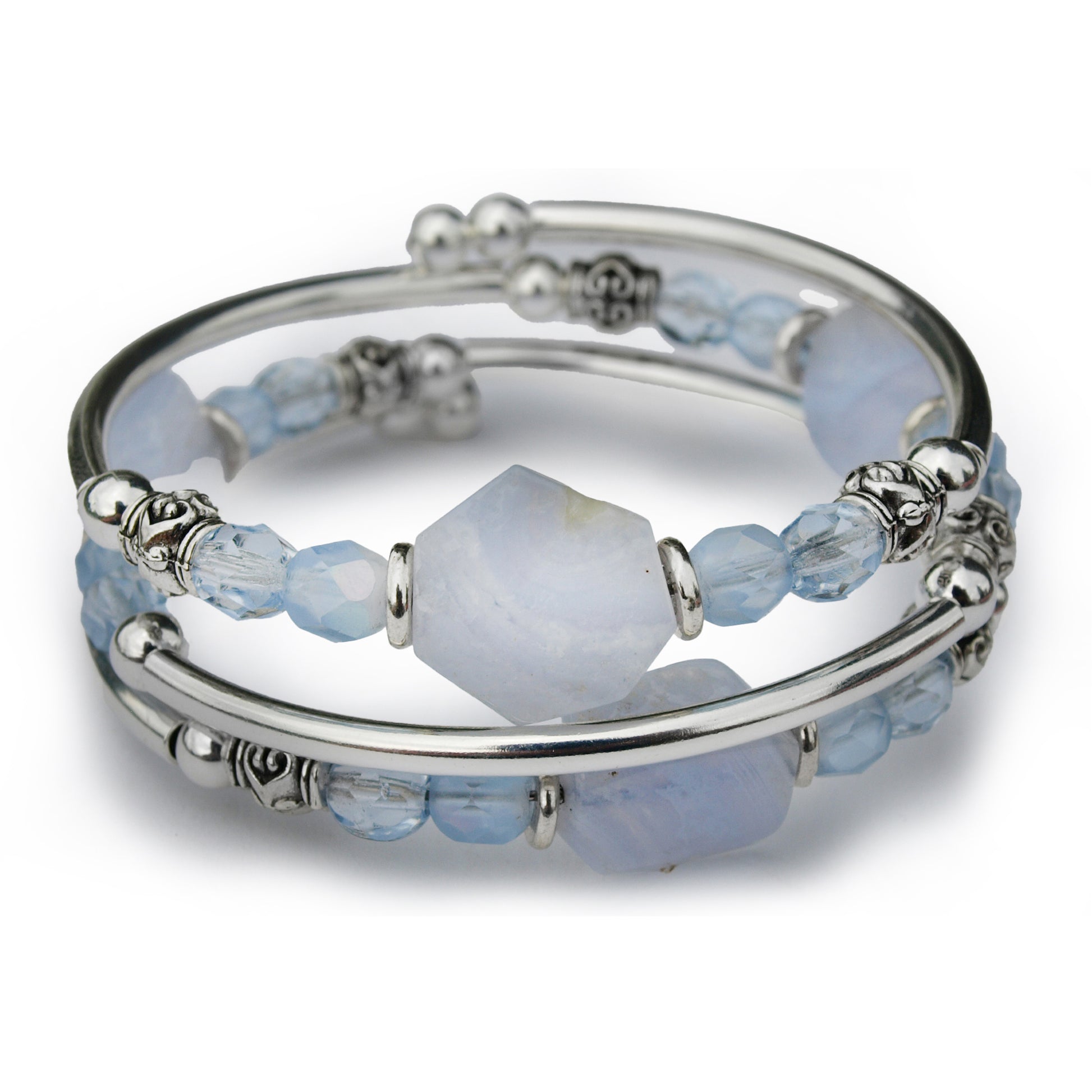 Beaded bracelet with blue and silver beads on a white background