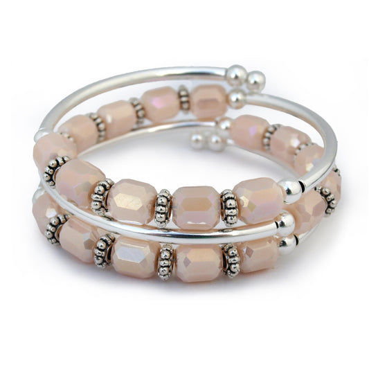 Pink and silver bracelet on a white background
