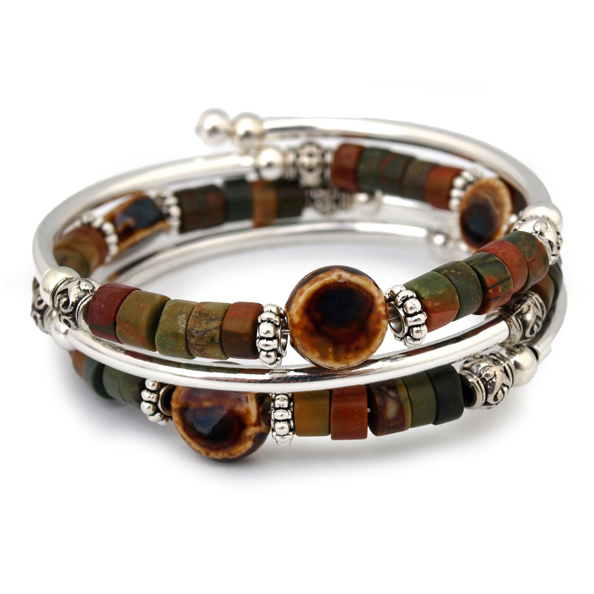 Brown and green beaded silver bracelet on white background 