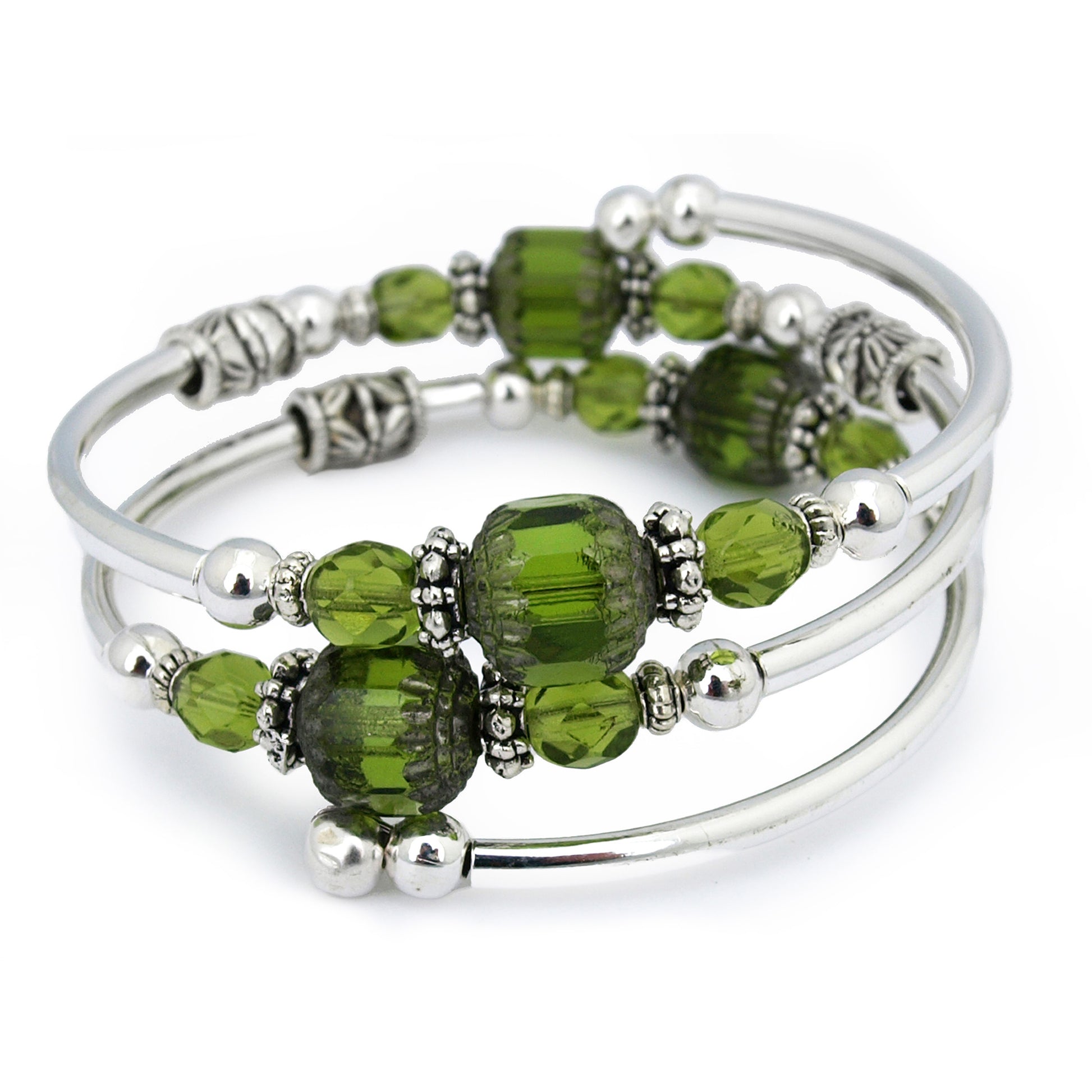 Silver bracelet with green faceted beads on a white background