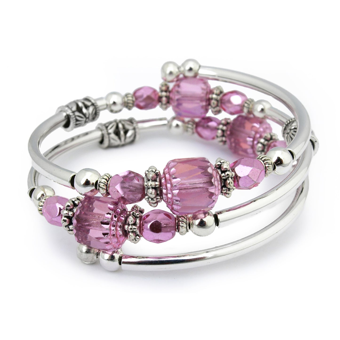 Silver bracelet with pink faceted beads on a white bacground