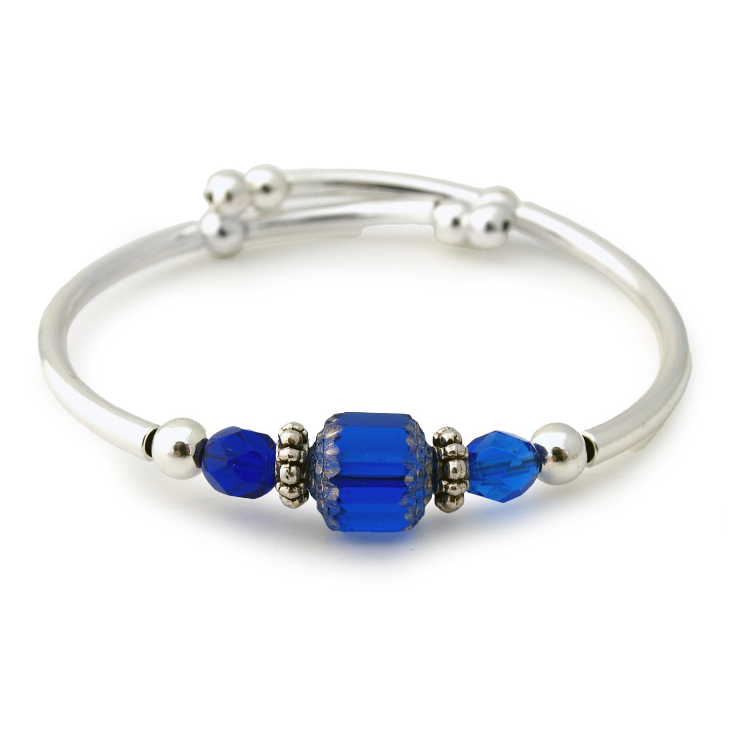 Silver bracelet with blue beads on a white background