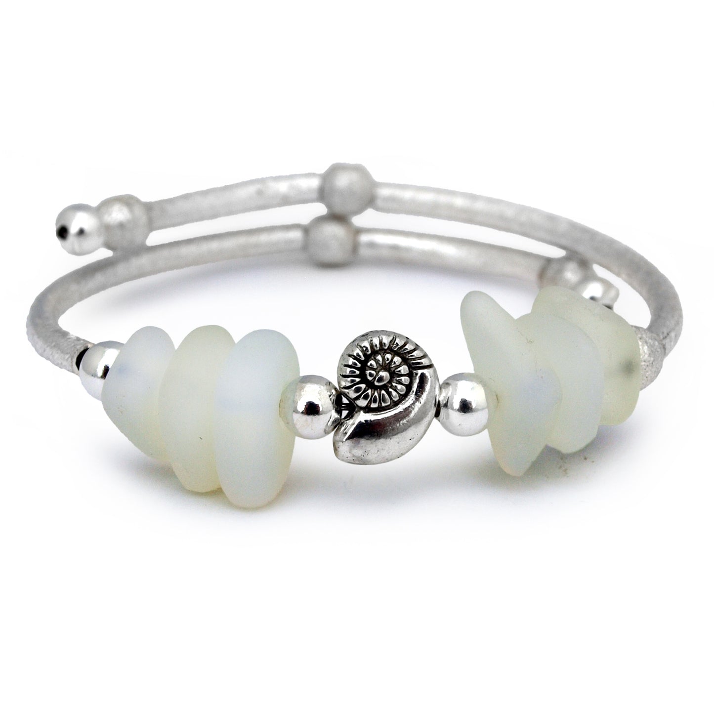 Silver bracelet with opaline sea glass beads and nautilus shell charm on white background