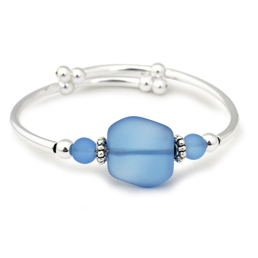 Silver bracelet with frosted sapphire blue sea glass bead