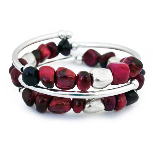 Silver wrap bracelet with magenta and burgundy beads on white