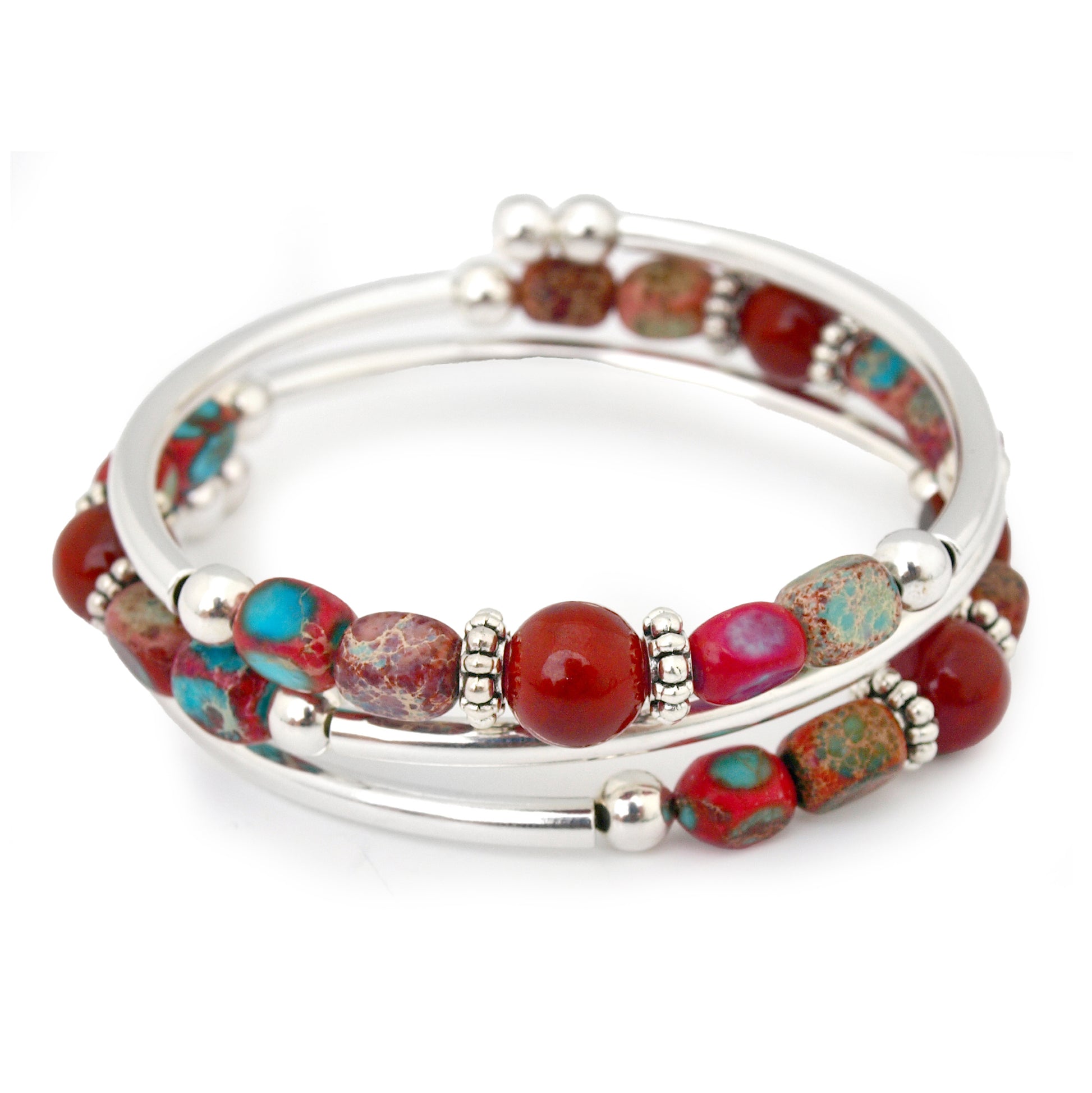 Bangle with red and turquoise beads on a white background