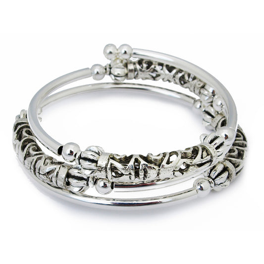 Patricia - Curved Carved Silver Tube Bracelet