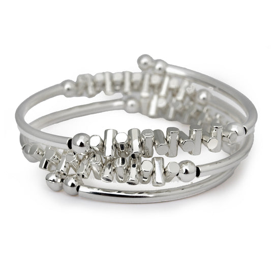 Silver fishbone bracelet on wrist with coastal style