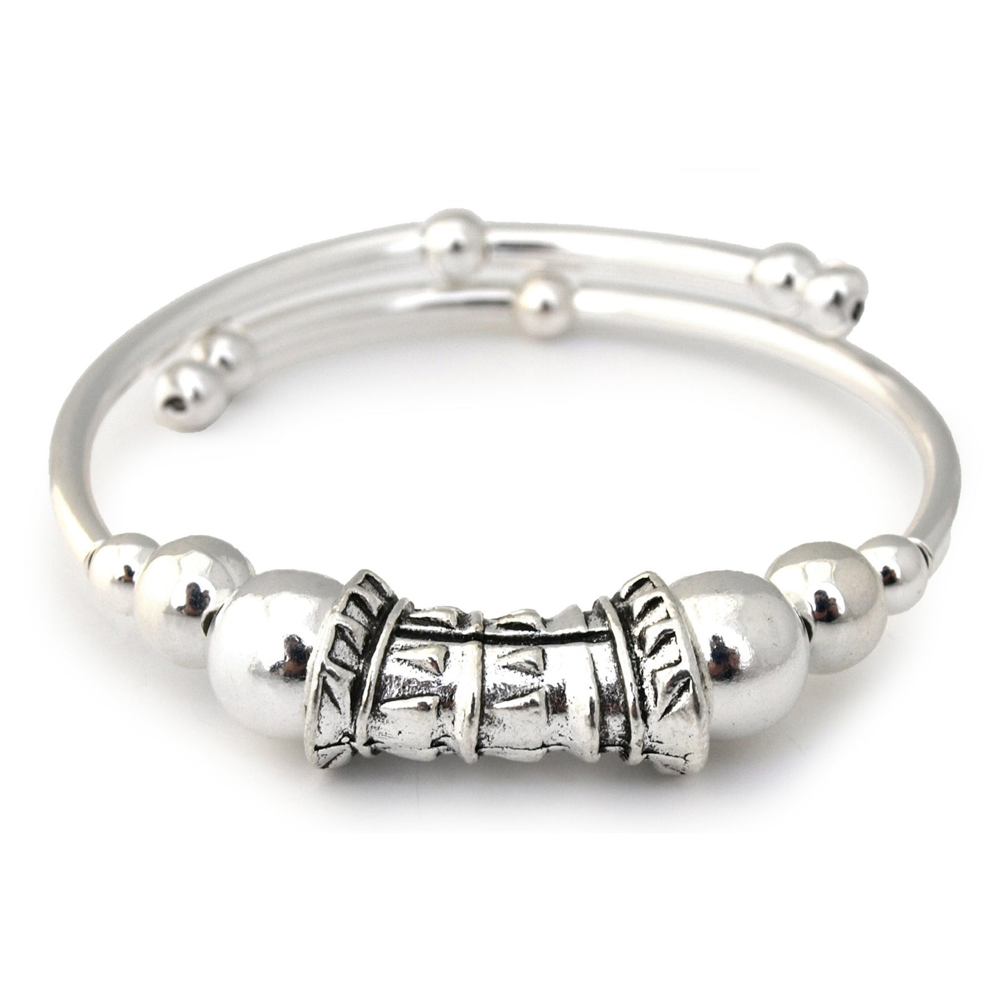 Silver bracelet with decorative beads on a white background