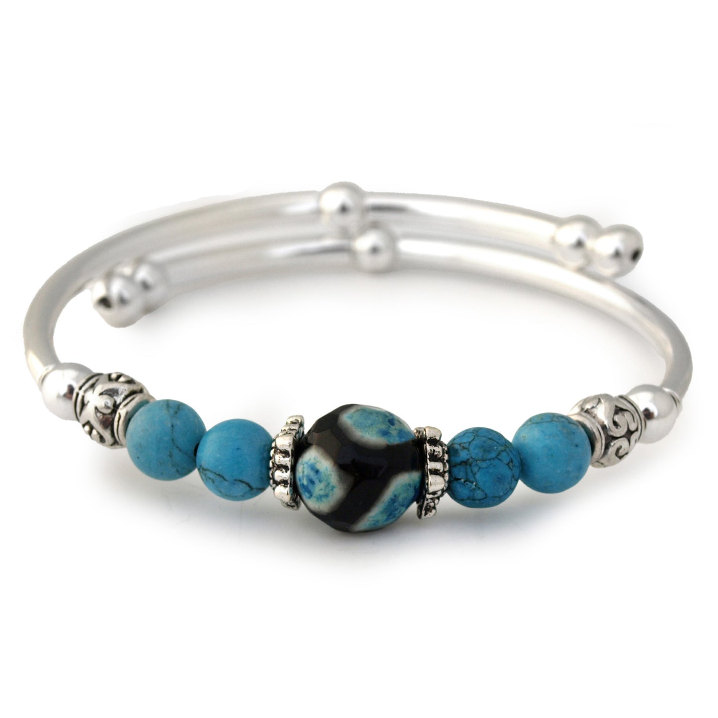 Silver bracelet with blue and black beads on a white background