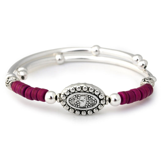 Silver bracelet with a purple cord on a white background