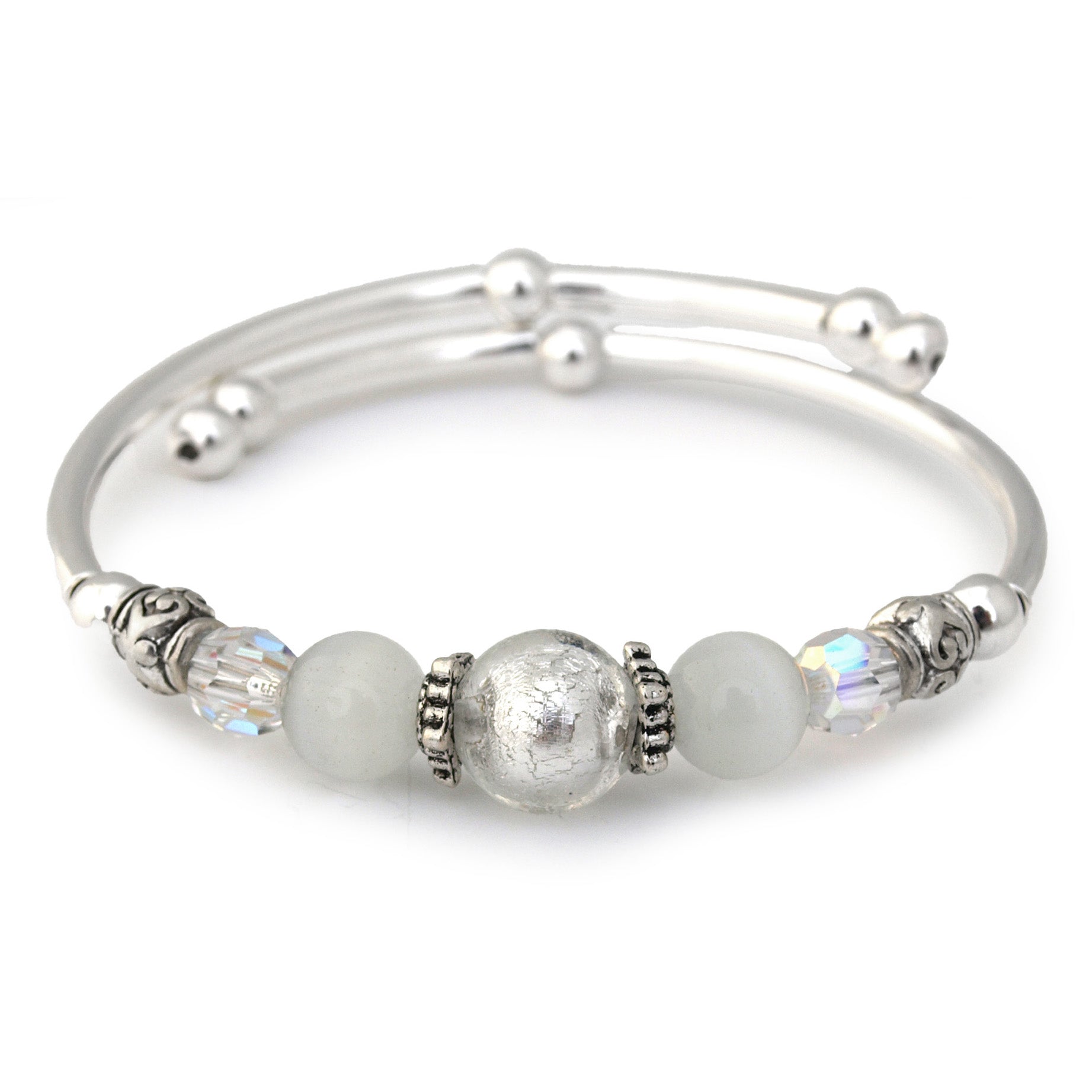 Silver bracelet with beads on a white background