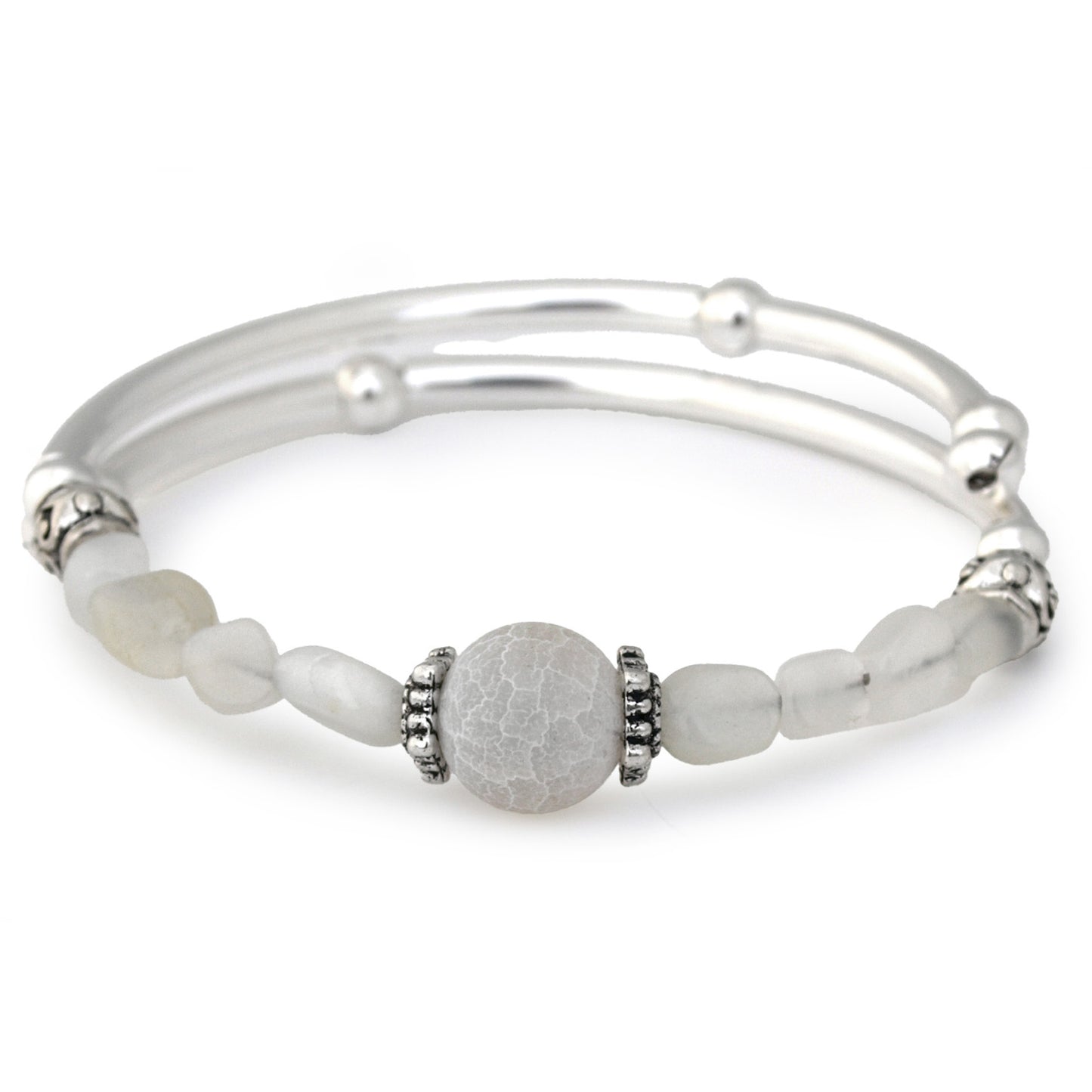 Silver bracelet with white beads on a white background
