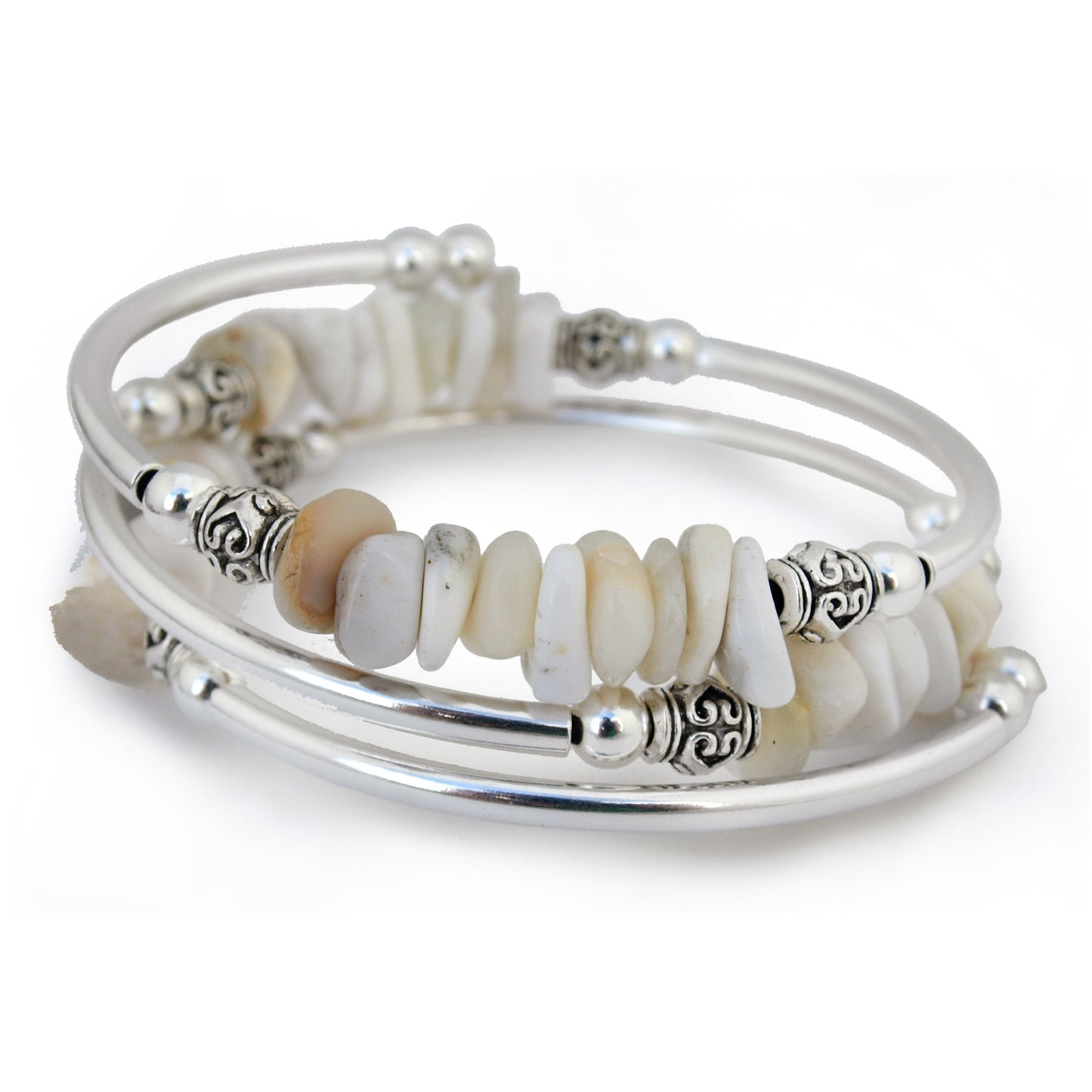 Silver bracelet with white agate nuggets on a white background
